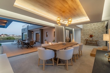 designer dining room in langebaan country estate, build by crontech consulting home builder in langebaan